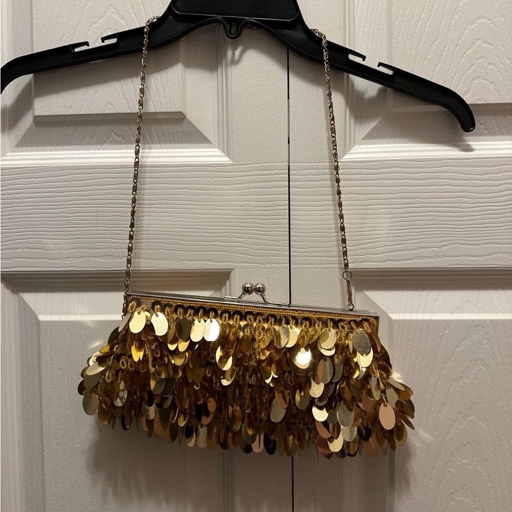 Gold shimmering clutch purse with strap